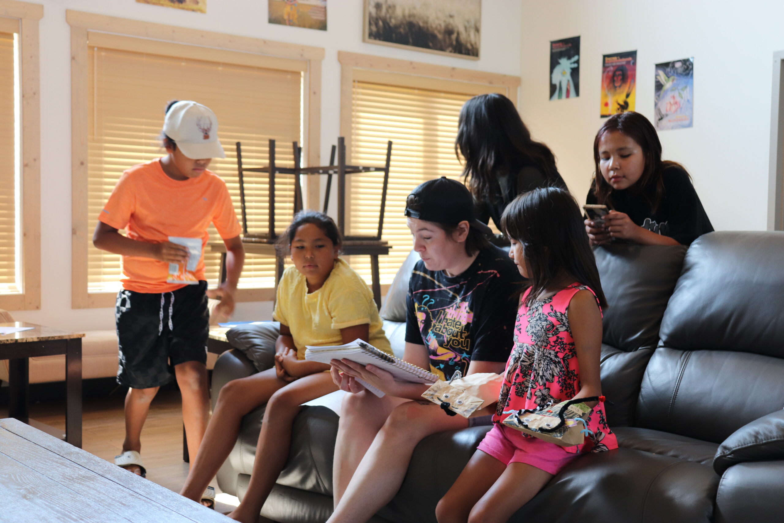 Kat Maclean and Indigenous youth at Beardy's Camp, Gordon Tootoosis Nīkānīwin Theatre